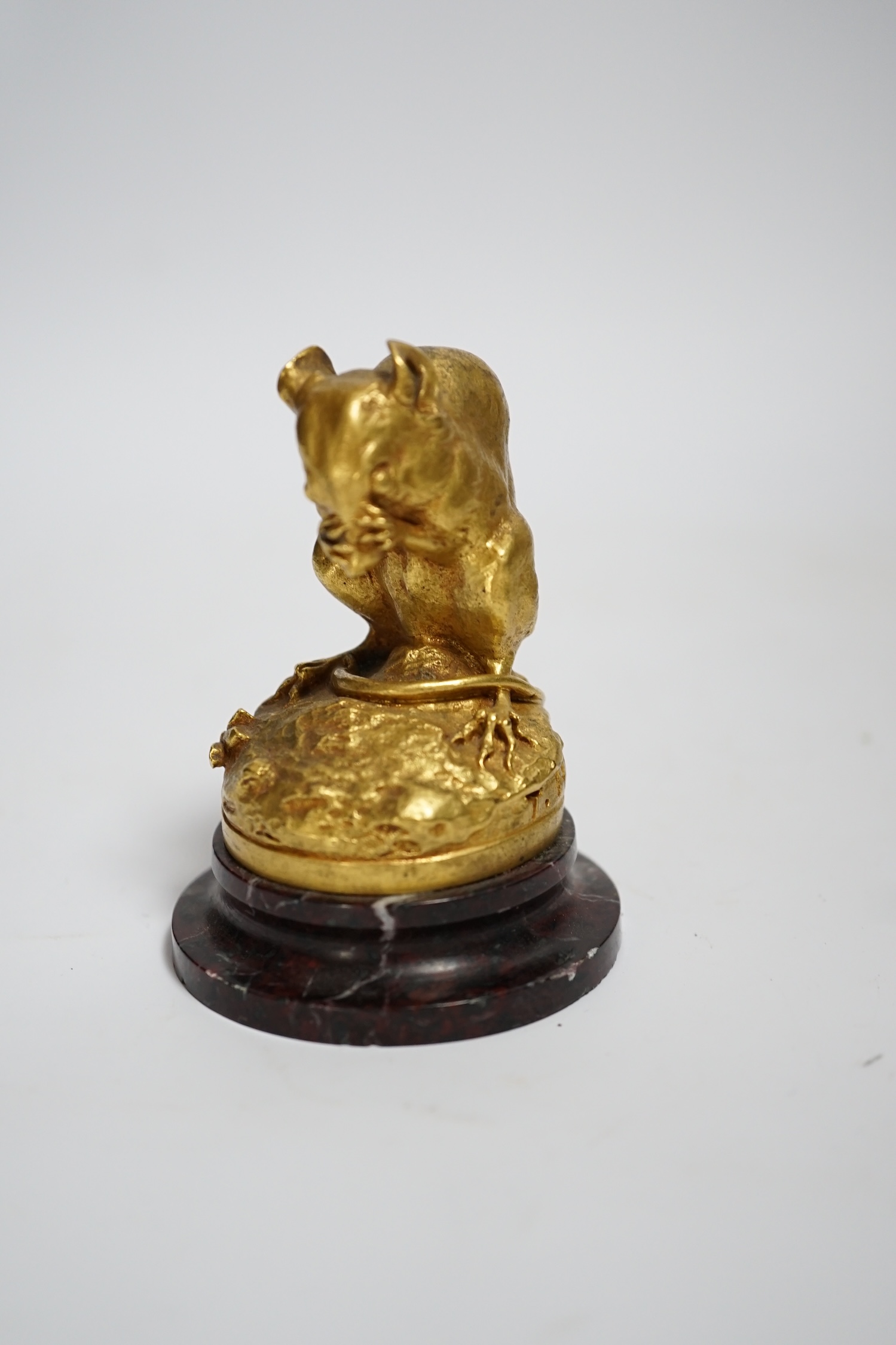 After Theophile Hingre, a small gilt bronze model of a mouse, raised on marble base, 8cm high